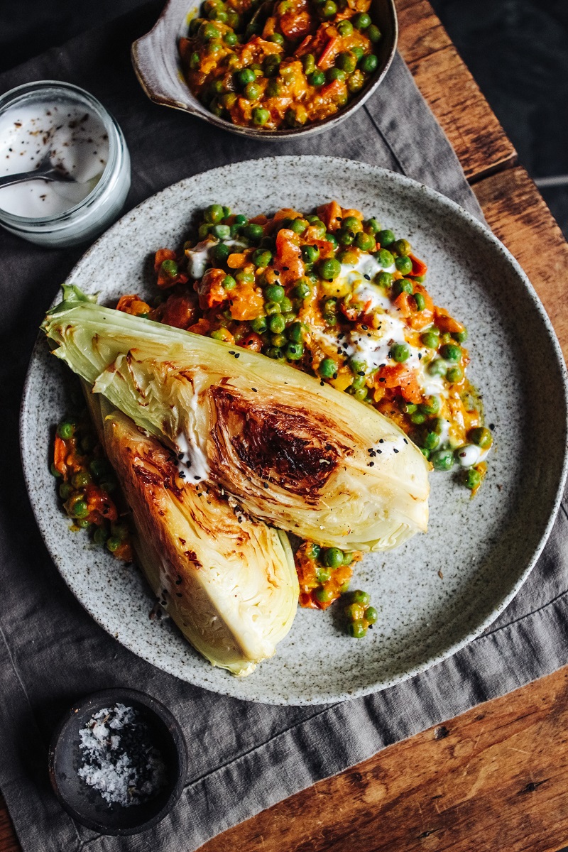Charred Hispi Cabbage With Tomato, Pea And Coconut Curry